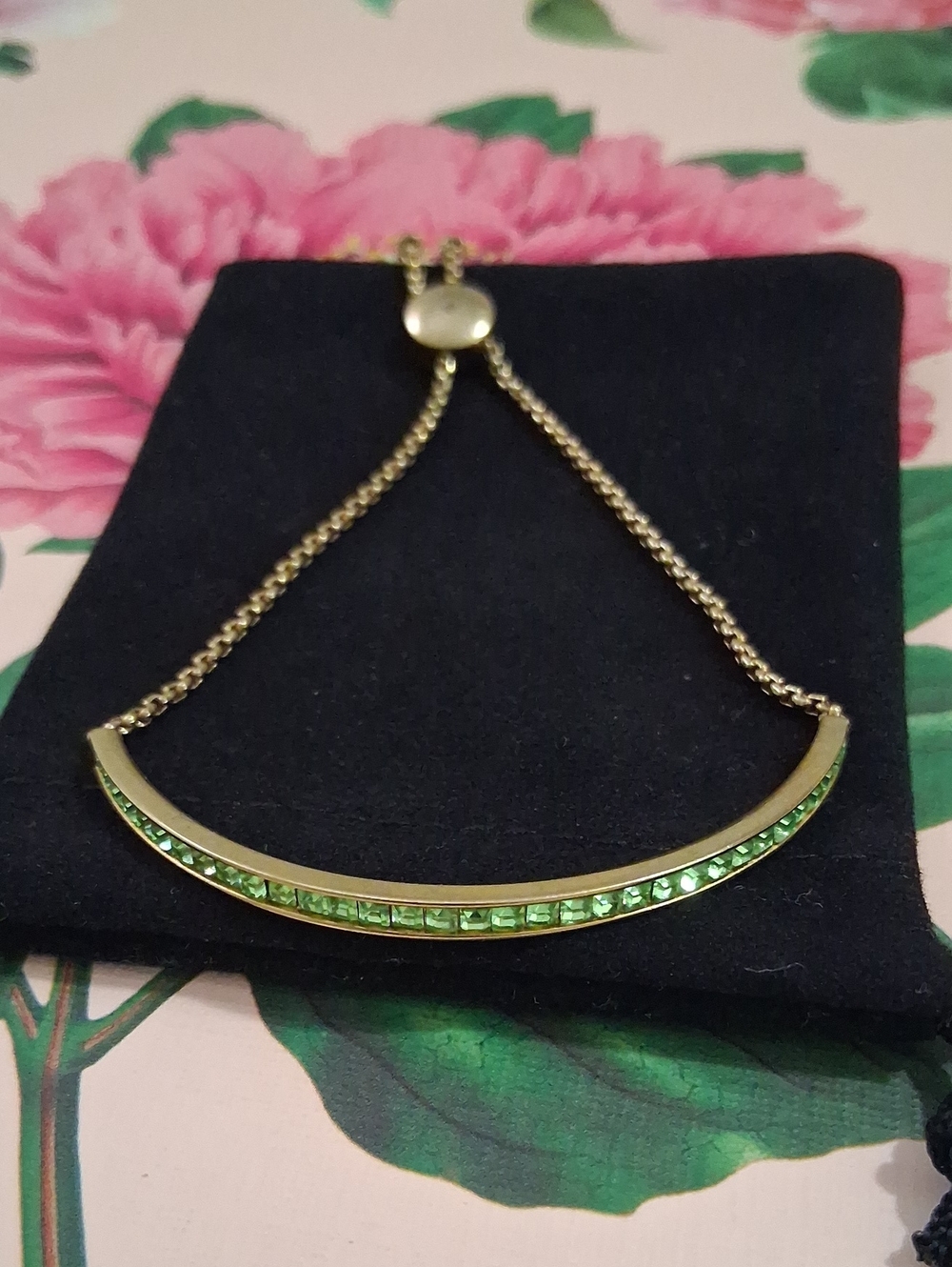 Michael Kors. Gold-Tone Bracelet with Green Crystal Accent